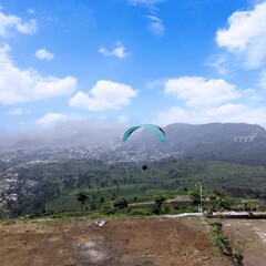 paraglider over the mountains