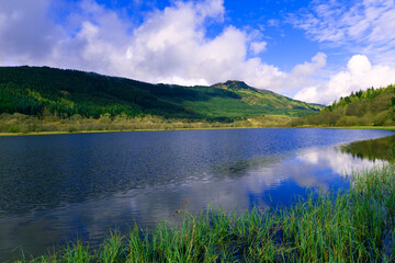 Fototapeta premium Reflections at Loch Leven, in the Tossachs, Scotland.