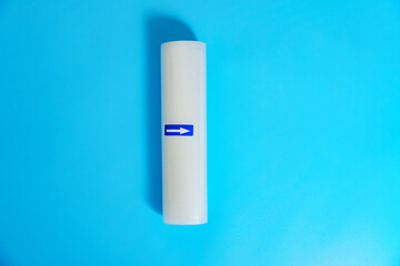 Roll film for a product vacuum sealer machine on a blue background.