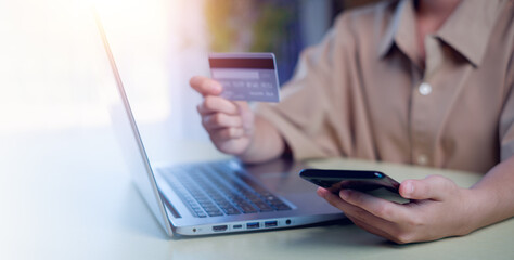 online shopping concept. hands holding credit card and using smart phone. shopping online payment by using smart phone.