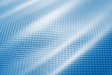 film for a product vacuum sealer machine on a blue background.