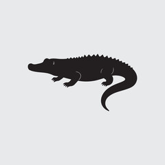 Fototapeta premium Silhouette of a Crocodile vector illustration art, isolated on a white background.