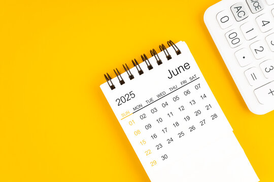 June 2025 calendar and calculator on yellow background.