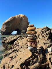 balanced stones on the beach
