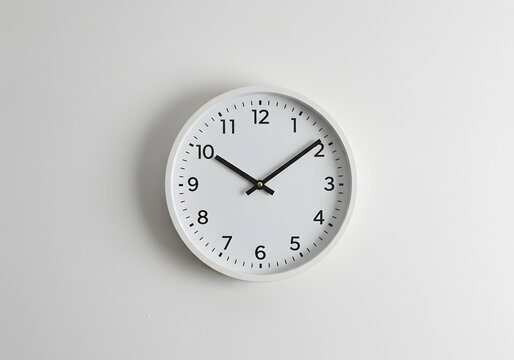 A minimalist wall clock displaying the time, perfect for home or office decor, emphasizing simplicity and functionality