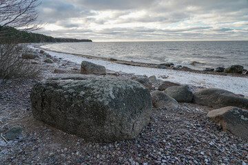 a large stone on the seashore