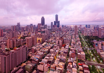 Aerial view of Downtown Kaohsiung at dusk, a vibrant seaport city in South Taiwan, with the famous...