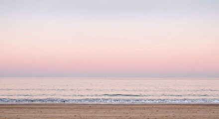 Obraz premium Minimalist Seascape Landscape Wide Sandy Beach and Calm Ocean Horizon View
