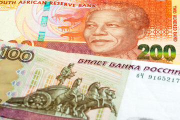 200 South Africa rand and 100 Russian ruble banknotes. International trade concept