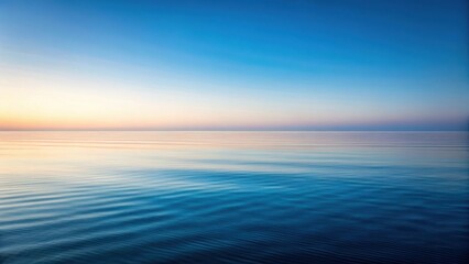 Fototapeta premium Serene Ocean Horizon at Dawn A Tranquil Seascape Showing Gentle Waves and a Calm, Colorful Sky