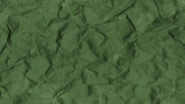 Animated green paper texture, looped animation. 
