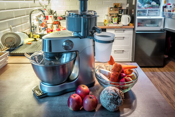 Modern food processor with juicer is ready for juice making, healthy organic fruits and vegetables