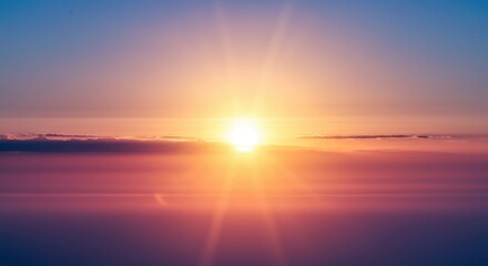 Fototapeta premium Glowing sun behind thin veil of clouds