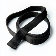 Close up of a coiled black nylon strap on a white background studio