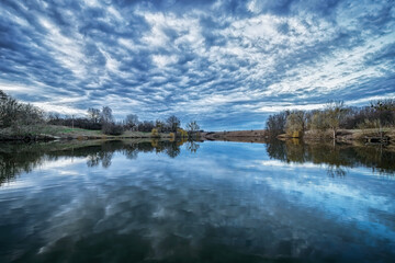 Pond in the village in winter