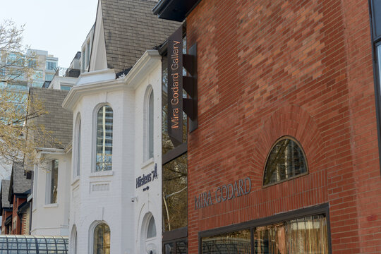 exterior building facade and sign of The Mira Godard Gallery, located at 22 Hazelton Avenue, in Toronto, ON
