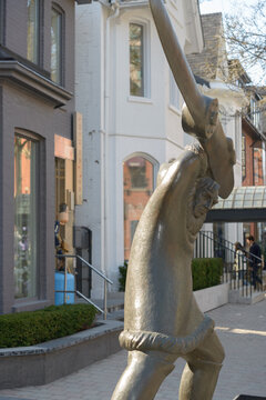 statue of an Inuit with propeller on Hazelton Av in Toronto, Canada