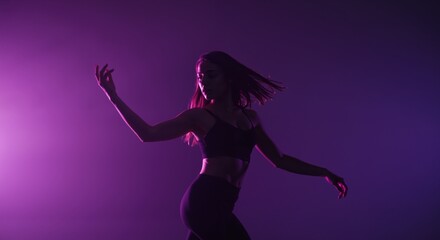 Dancer expressing emotion in dynamic movement against colorful backdrop  