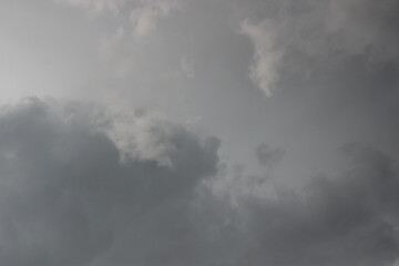 moody gray rain clouds texture photo for wallpaper backgrounds, dramatic stormy sky with soft transitions and depth