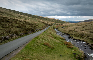 The single track road to Trecastle in the Brecon Beacons, South Wales, UK