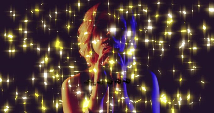 Teenage singer holding microphone in dark studio, showing entertainment with light particles
