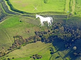 Aerial view of Bratton Camp iron age fort in Wiltshire and Westbury White Horse	
