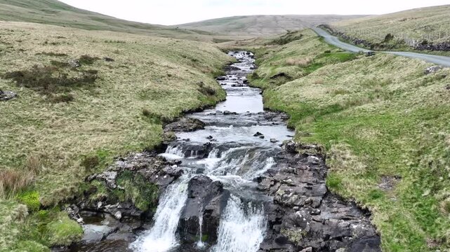 A small waterfall on the River Tawe quite close to its source alongside the old Trecastle road in the Brecon Beacons, South Wales.