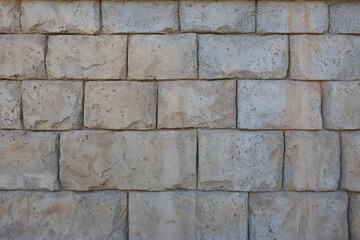 Seamless Beige Stone Wall Texture for Background or Design