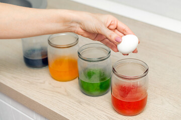 painting easter eggs at home, close-up. 