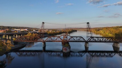 Albany New York Riverfront Rail Bridge and Highway Aerial 4K Drone Video - Powered by Adobe