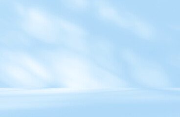 Empty blue room studio with shadow of leaves on concrete wall and floor for product presentation. Sunlight effect shadow. Minimal winter backdrop. Cosmetic, beauty and fashion showroom.