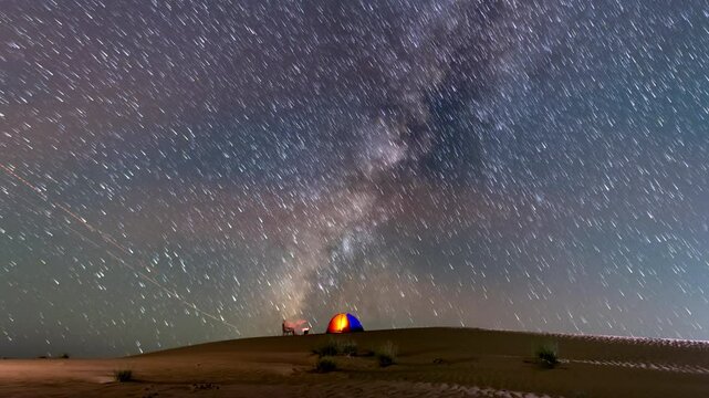 4k Time lapse of camping in desert sans dune with beautiful night Stars milky way motion