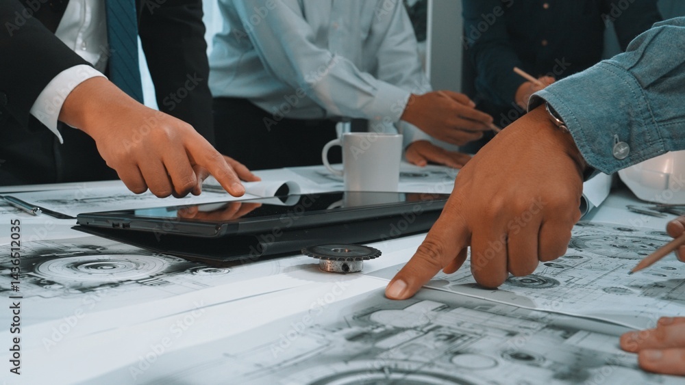 Aufkleber a dynamic business meeting scene features engaged professionals discussing technical blueprints on t