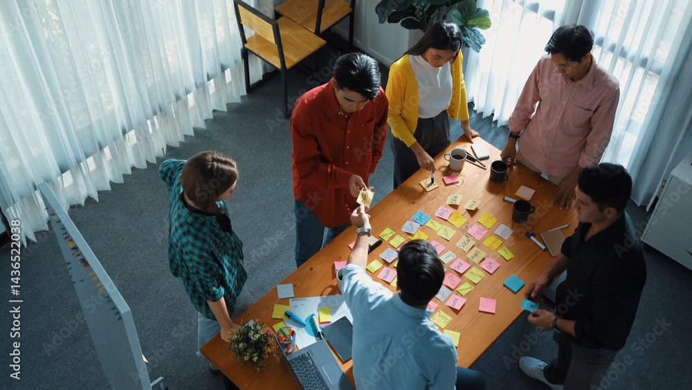 Poster top view of diverse business people writing and stick sticky notes at whiteboard. creative team work