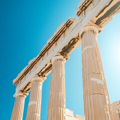 Naklejka premium Majestic Greek temple columns under the clear blue sky high resolution picture
