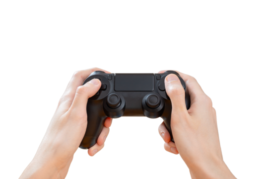 Hands grips a black video game controller, isolated , cutout element