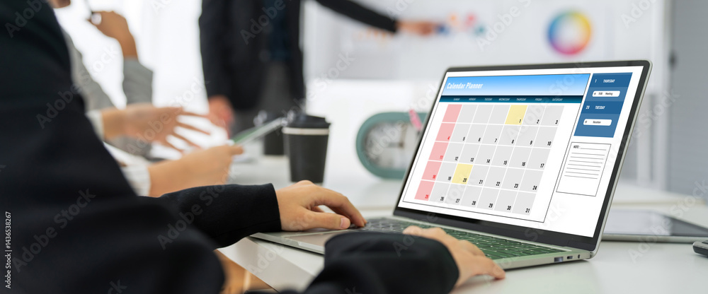 Poster calendar on computer software application for modish schedule planning for personal organizer and on