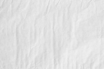 Grey crumpled paper with bumpy vertical lines