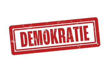 Demokratie (democracy) - A red stamp, isolated on white background.