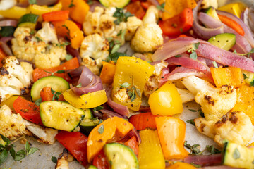 Close up of Roasted Vegetable Salad with Fresh Herbs and Sprouts