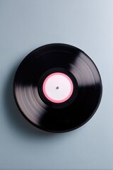 Fototapeta premium solitary vinyl record is placed on smooth solid color background embodying minimalistic elegance