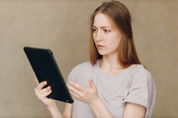 Fototapeta premium Portrait of young student actress learning role woman with digital tablet. Acting test casting film movie acting auditions.