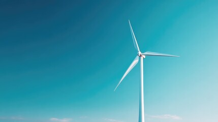 Fototapeta premium minimalistic wind turbine on hill against clear blue sky