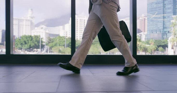Office building, window and businessman walking with legs for corporate, career and job in morning. Attorney, feet and travel with bag in law firm lobby for professional, work and start of legal case