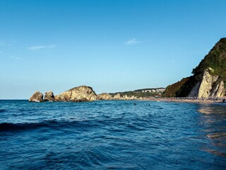 Fototapeta premium Scenic Coastal View with Cliffs, Blue Skies, and Ocean Waves, Sile Istanbul