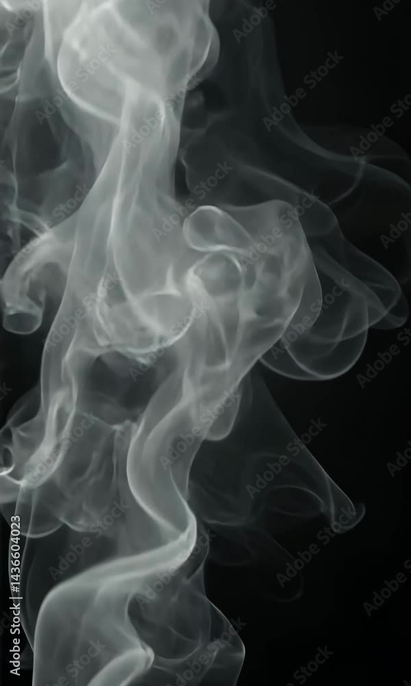 Poster smoke swirls in creative patterns with light effects captured in black backdrop