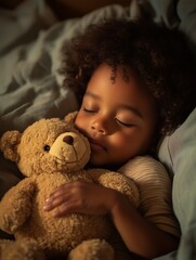 Young child peacefully sleeping with teddy bear in cozy bedroom at night, creating a warm and serene atmosphere