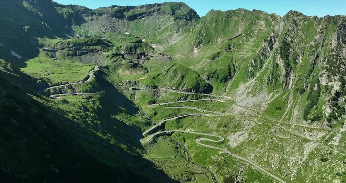 Hovering stationary motion of the Transfagarasan Highway which is a mountain road crossing the southern section of the Carpathian Mountains, Romania, Southern Europe