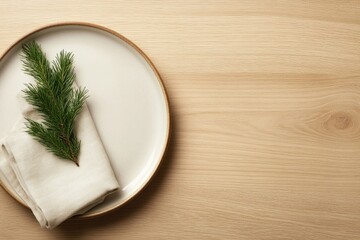 Minimalist plate featuring fresh dill, napkin, and wooden table
