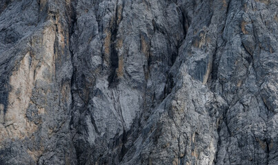 Stone texture, cliff rock background, grey mountain surface close up